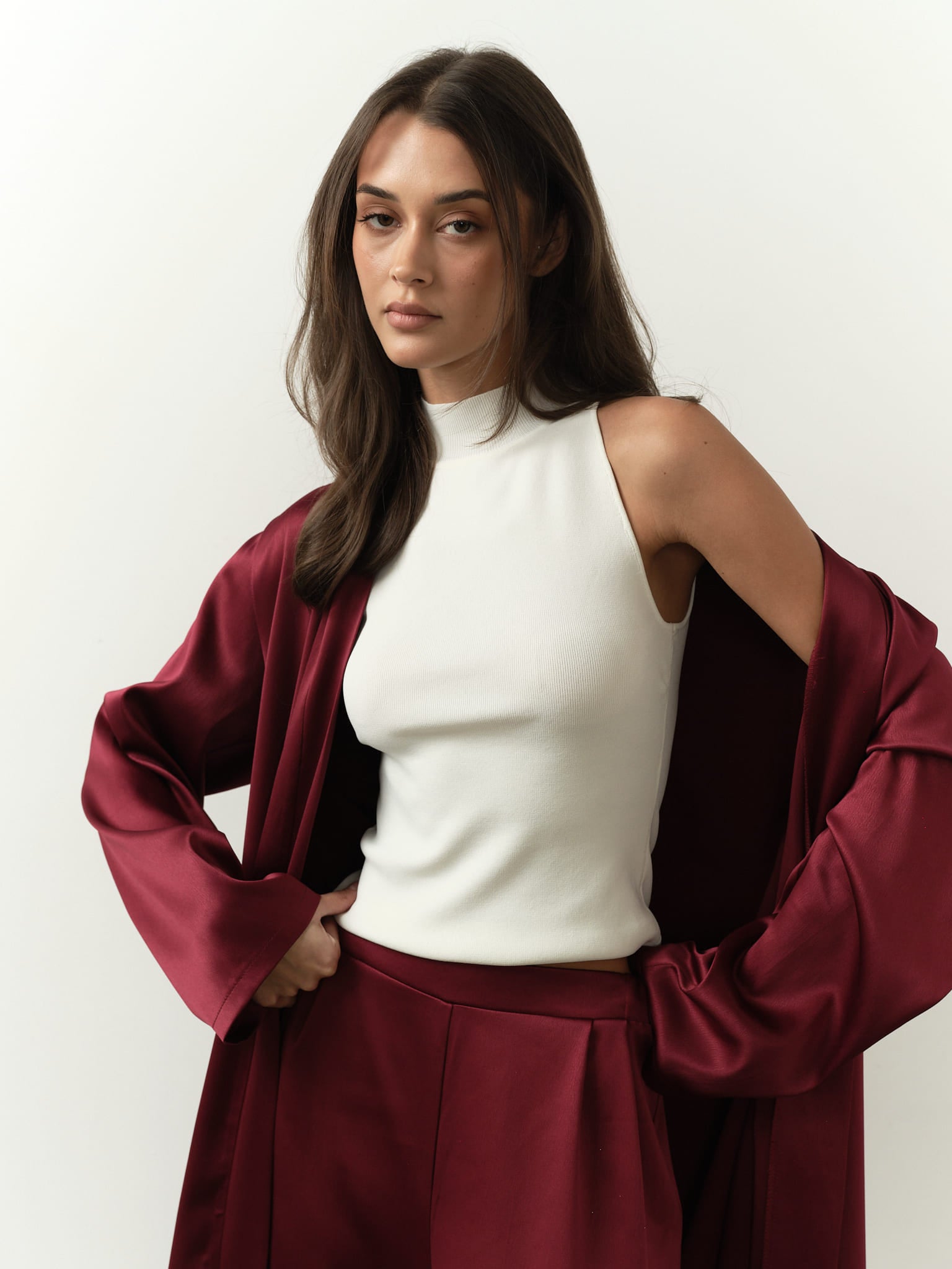 Talisa Set: Elegant burgundy satin full-length robe with wide-leg trousers, designed for effortless movement and modern sophistication.