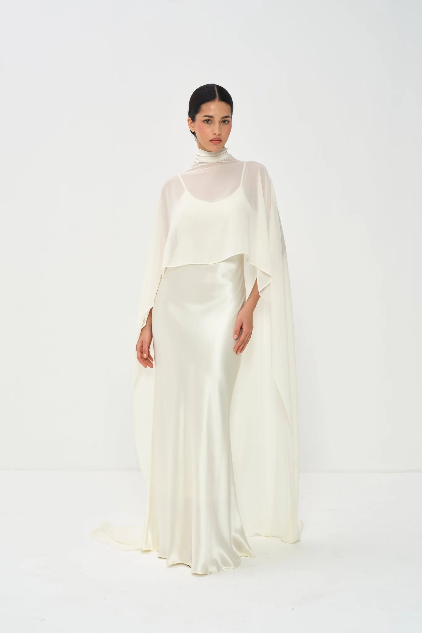 white dress with cape overlay Structured Midi  VOS LEE The bodice part covered by pleted chiffon Estelle Cape Gown in Naia