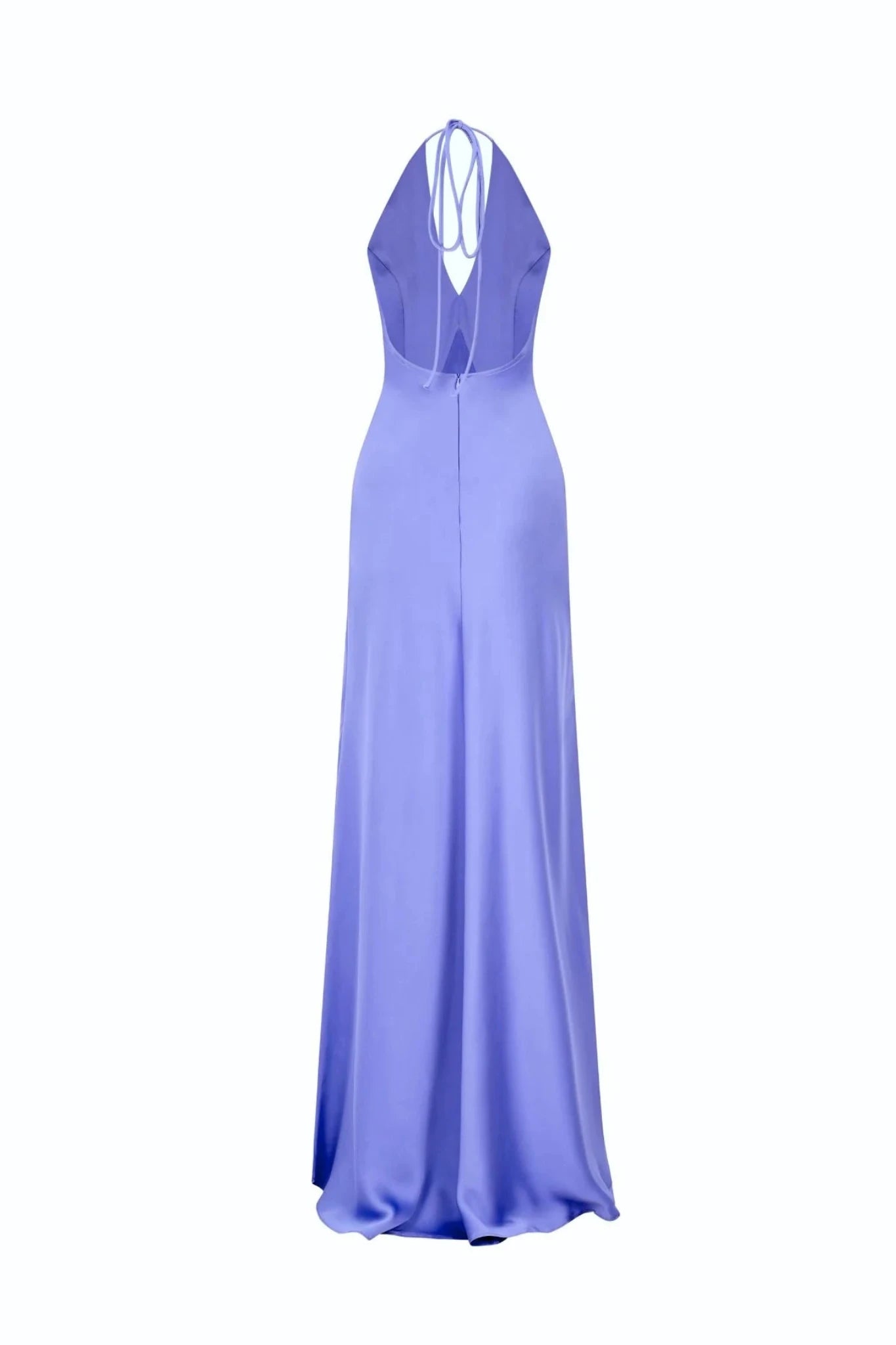 The Solange Dress is a long, elegant evening gown in a striking shade of lavender. It features a halter neck and an open back design, complemented by a fitted bodice that gracefully transitions into a floor-length skirt. The silky fabric of this dress perfectly captures sophistication and style.